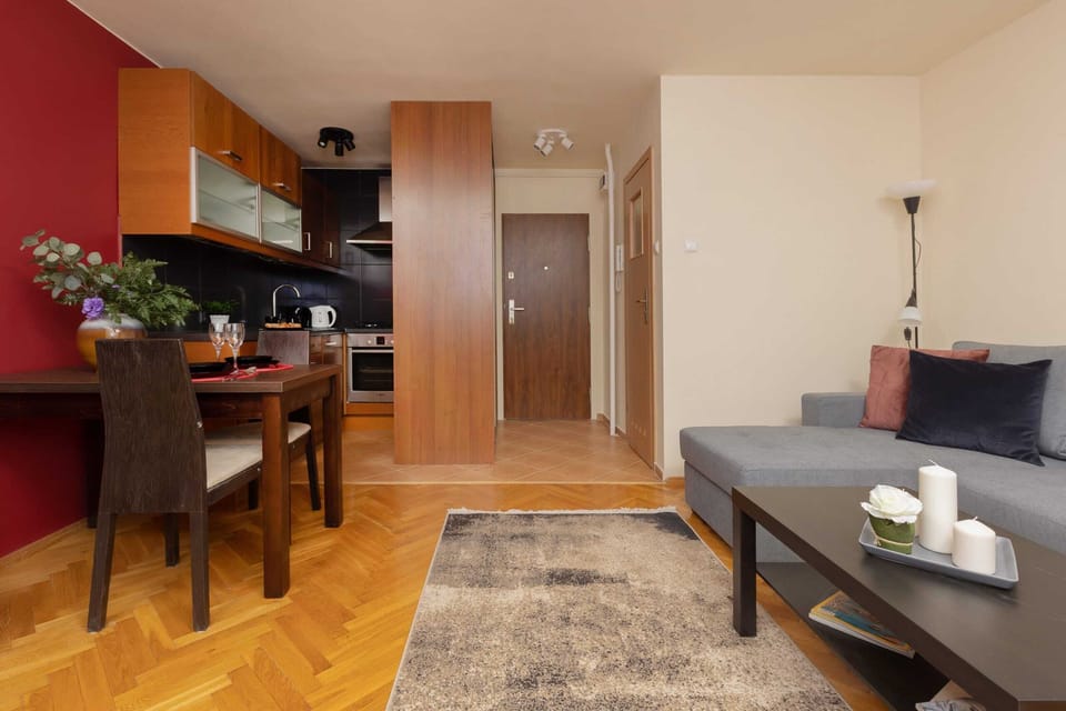 Another angle of the open-plan living and dining space, showcasing its functionality.
