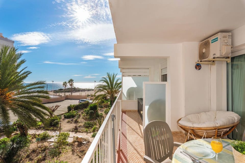 Pleasant beachfront apartment in Calpe (Costa Blanca), sleeps 5 people with three bedrooms and two shower rooms.INTERIOR: It consists of fully equipped kitchen, with dishwasher and hob, heated living room with access to an outdoor terrace overlooking the sea, three bedrooms (two with double bed and one with one single bed) and two separated shower rooms.EXTERIOR: Exterior parking space within the building's premises.LOCATION: It is undoubtedly the ideal place for a holiday without a car, due to its location just 30 meters from the main sandy beach of Calpe, the Arenal Beach. Also a short distance of just 600m, separates the apartment from the center of the town and all its services.OBSERVATIONS: Second floor. It does not have a lift. Free WIFI. Pets are not allowed.