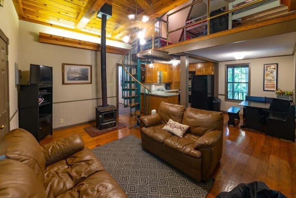 Sink into a comfy couch with a blanket and a good book.