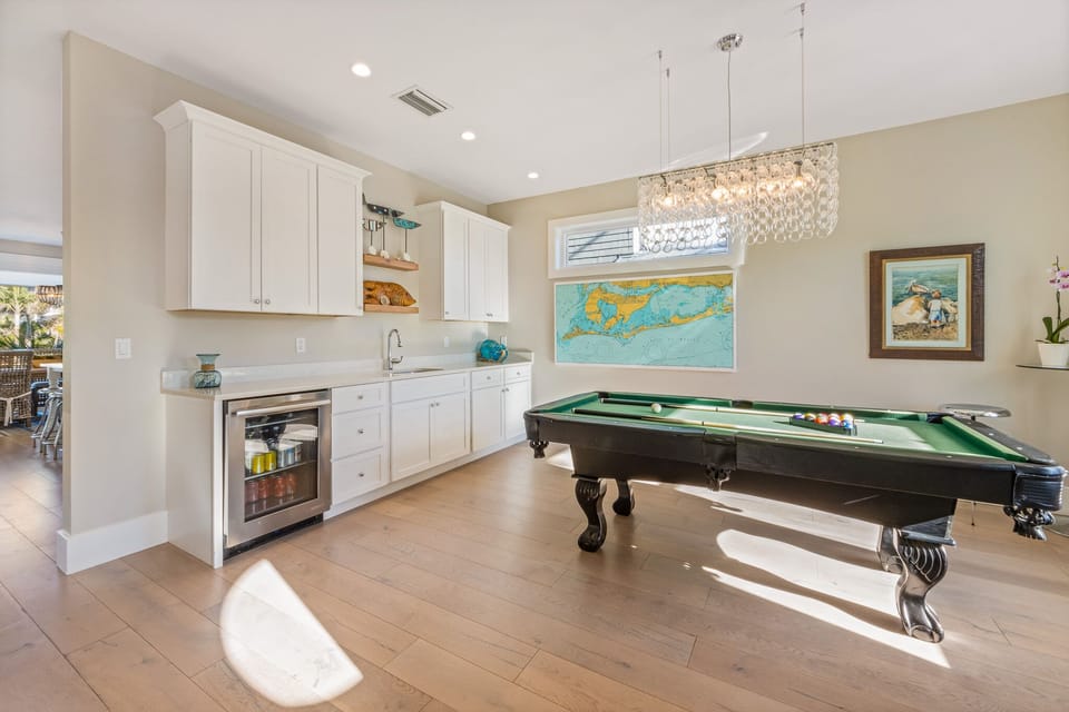 Billiards room with wet bar and mini fridge