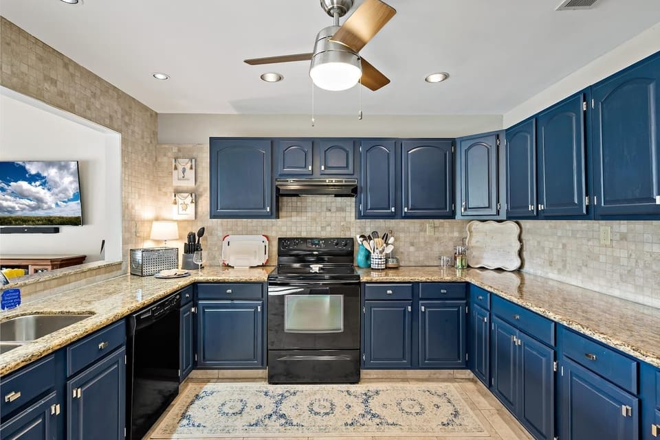 Our kitchen is open and easy to maneuver with multiple people once the dinner bell is rung!  It's well stocked and ready to create the best meal!  