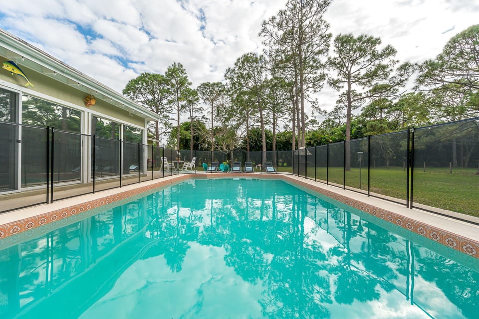 Outside is truly a fun-filled paradise. The expansive backyard is treat for kids and pets to play.