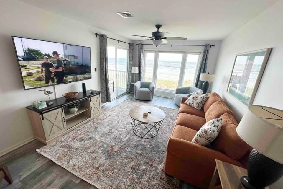 Unwind in the warm ambiance of our beautifully appointed living room