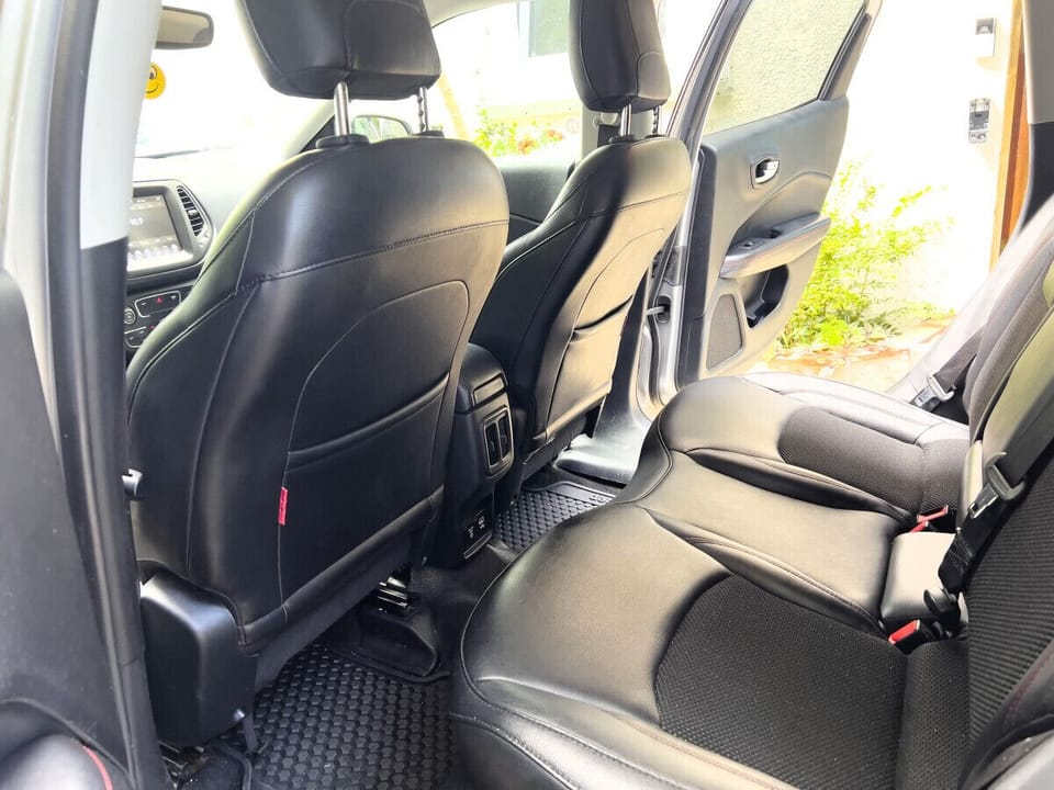 Experience island exploration in comfort and style with our jeep featuring luxurious leather seats and spacious interiors. This is the perfect island vehicle.
