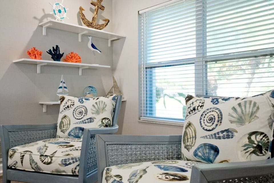 Coastal charm meets cozy comfort. Our seashell print couch brings the soothing vibes of the beach right into the heart of our living room.