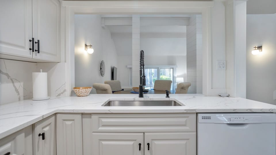 The open layout flows easily into the rest of the home, making it an ideal space for everyday living or entertaining during your Hilton Head getaway.