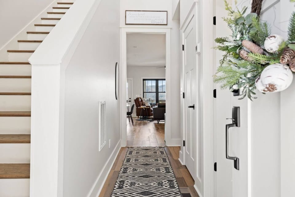 Main entrance foyer view. The bedroom and full bath are on the right side of the hallway. 