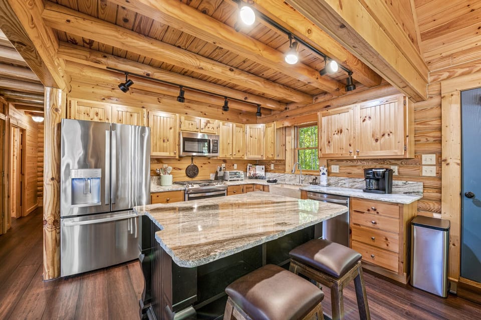 Beautiful kitchen w/ granite, farmhouse sink, & stainless steel appliance