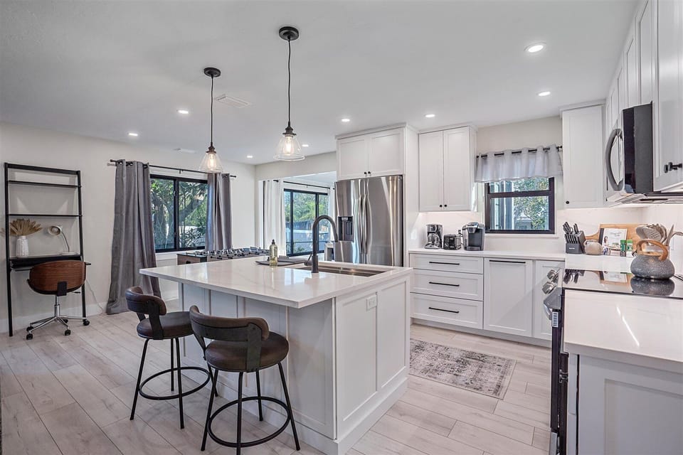 Hang out on the comfy bar stools at the kitchen island.
