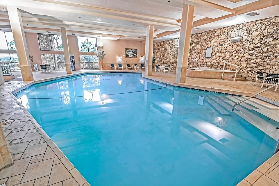 Dive into the serene indoor pool for year-round relaxation.