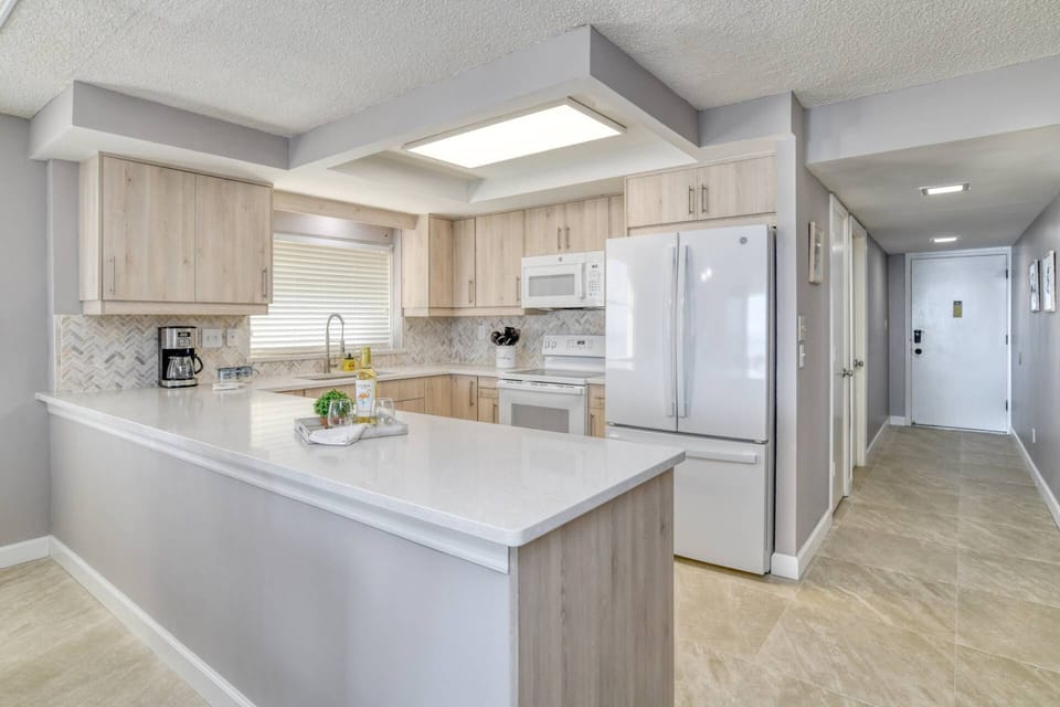 The modern appliances and spacious counters make preparing meals a breeze.