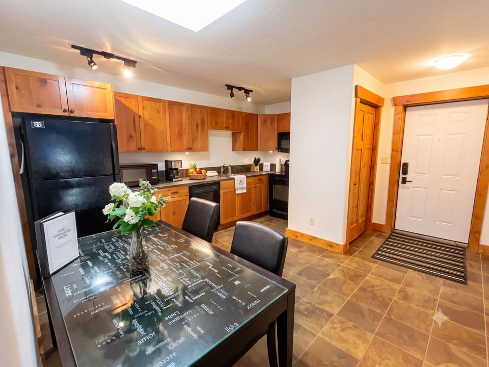 The basement has an extra seating area, kitchen (no working stove on this level) and dining table.  Plenty of room for everyone to have their own space.