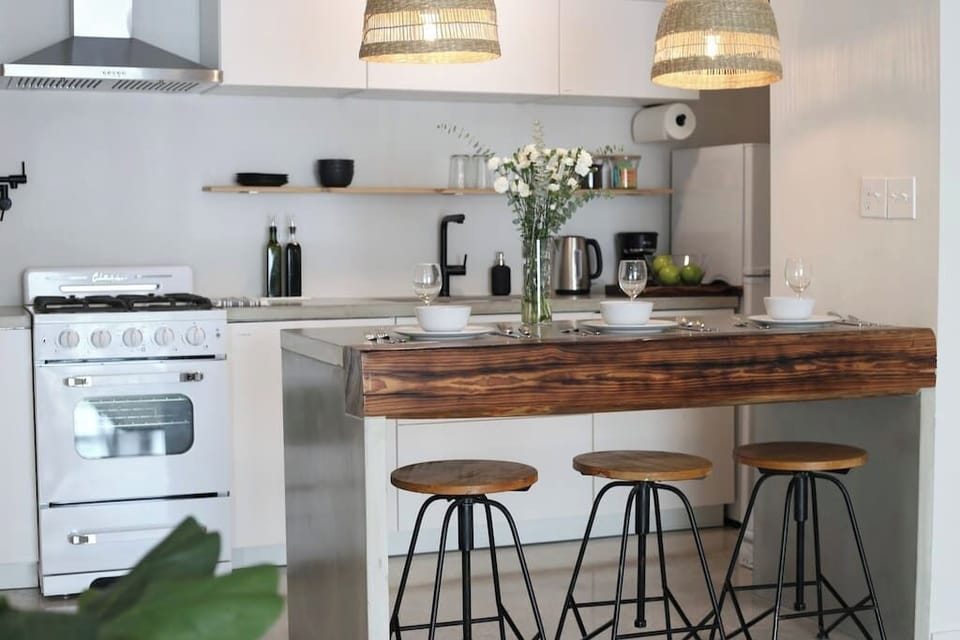 Whip up a meal in the fully equipped kitchen and enjoy casual bites at the stylish breakfast bar.