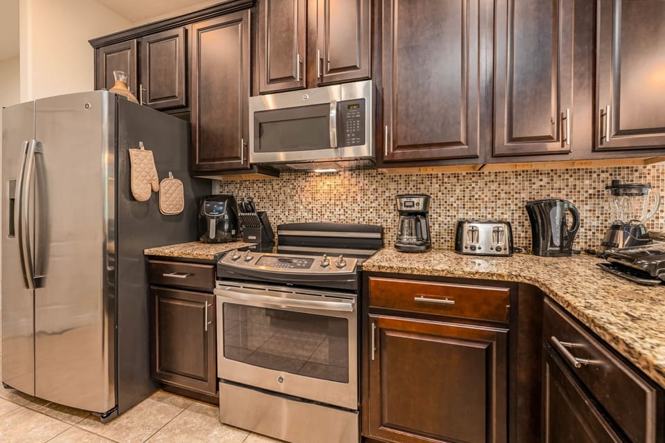 Cook with ease in a fully stocked kitchen with a dishwasher.