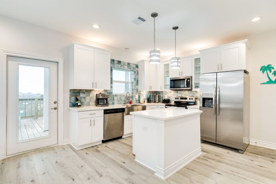 Fully equipped kitchen with stainless steel appliances