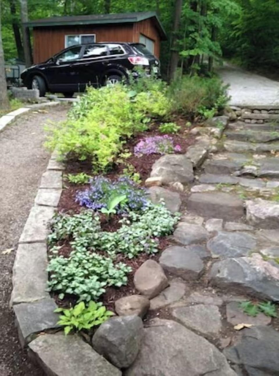 path and stone steps from the parking area to the front sliding door. 