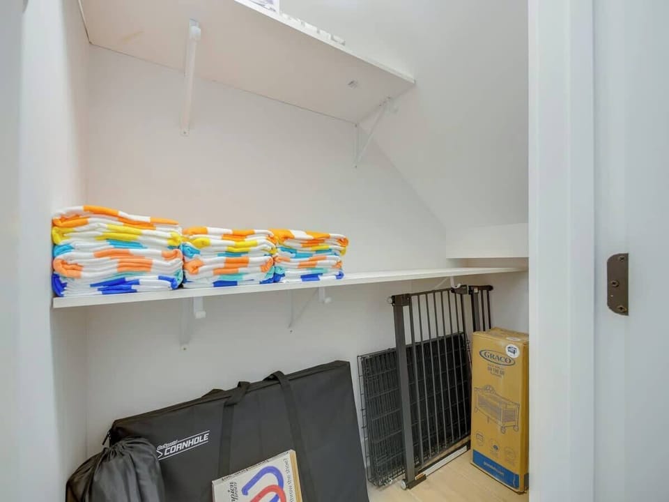 Extra storage - as well as beach towels, dog towels, child gate, dog kennel, ironing board/steamer, and pack n play