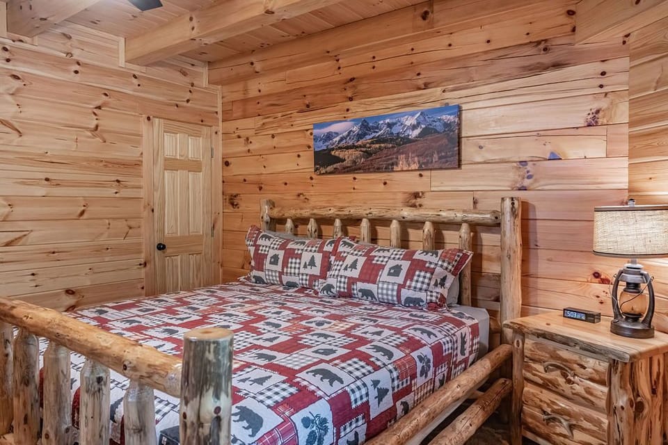 Main level king bedroom (#1 of 5) + en suite full bathroom