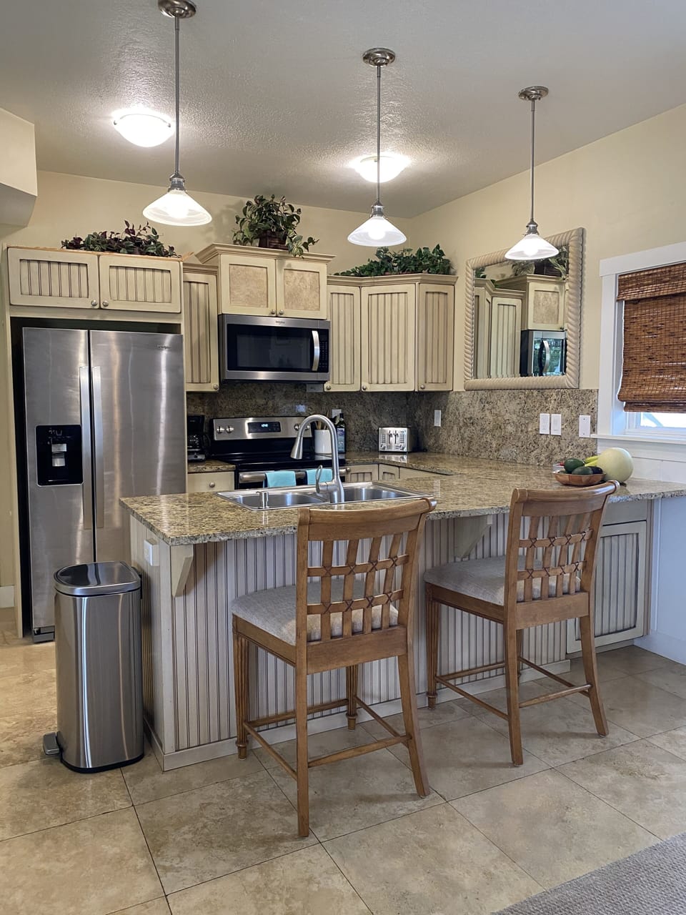 Gourmet kitchen with flat top range and full size fridge 