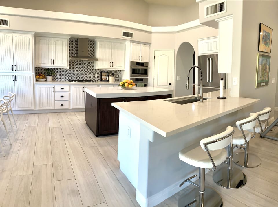 Open Bright White and Crisp and Clean Kitchen w/ High End Appliances Bar Seating