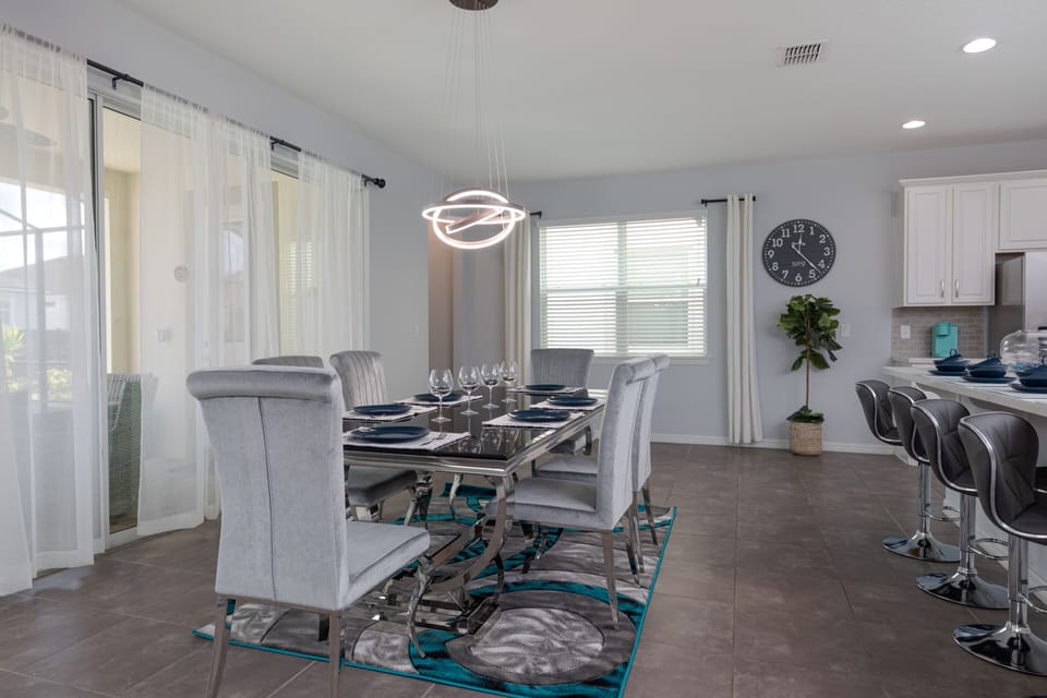 Dine elegantly with views of the stunning outdoor pool.
