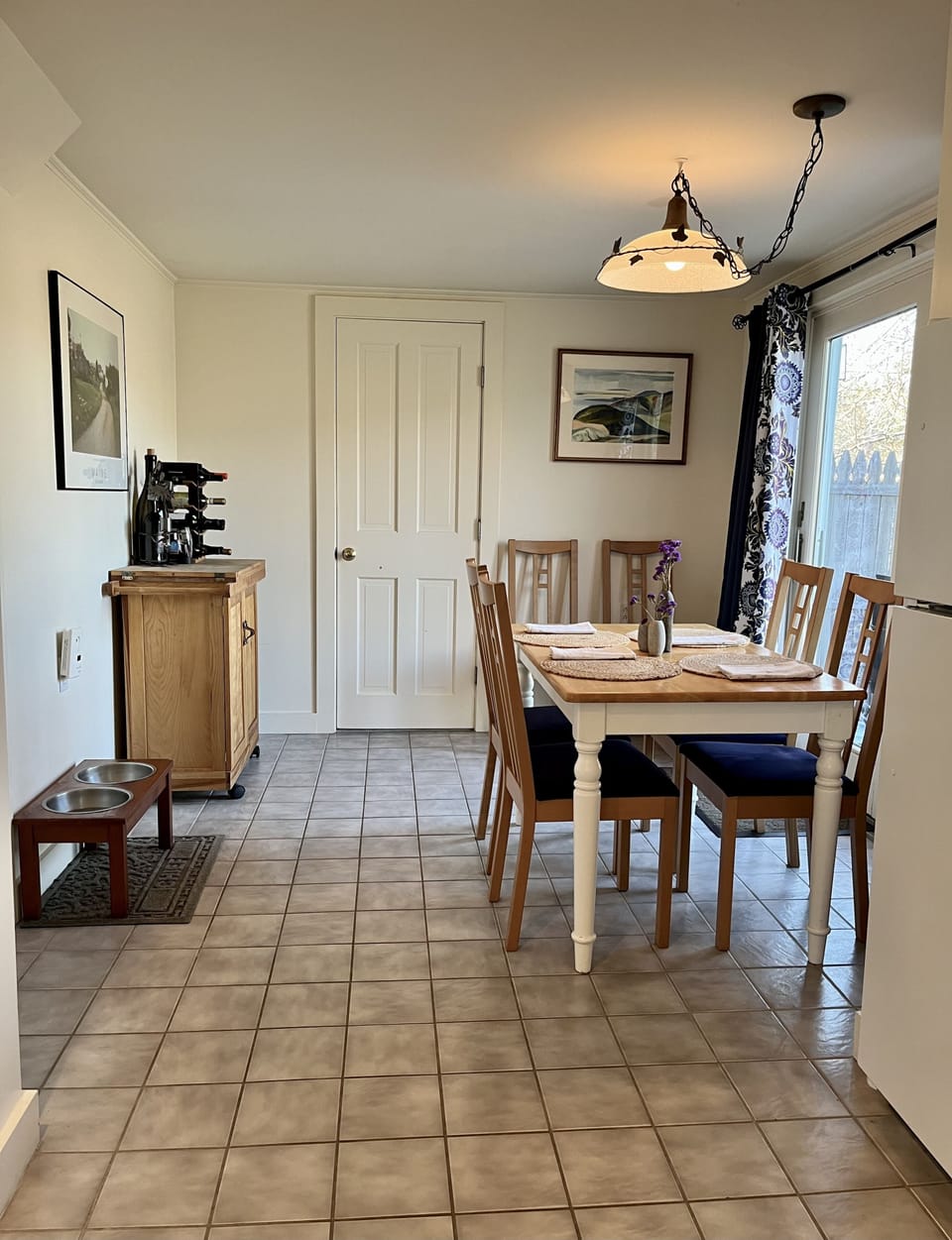 Dining Area for 6  through the sliding glass door is the back deck.