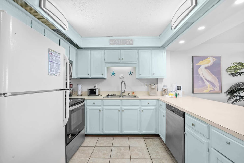 his spacious kitchen serves up ocean views right from the stove—perfect for whipping up your favorite meal with a side of sea breeze and sunshine.