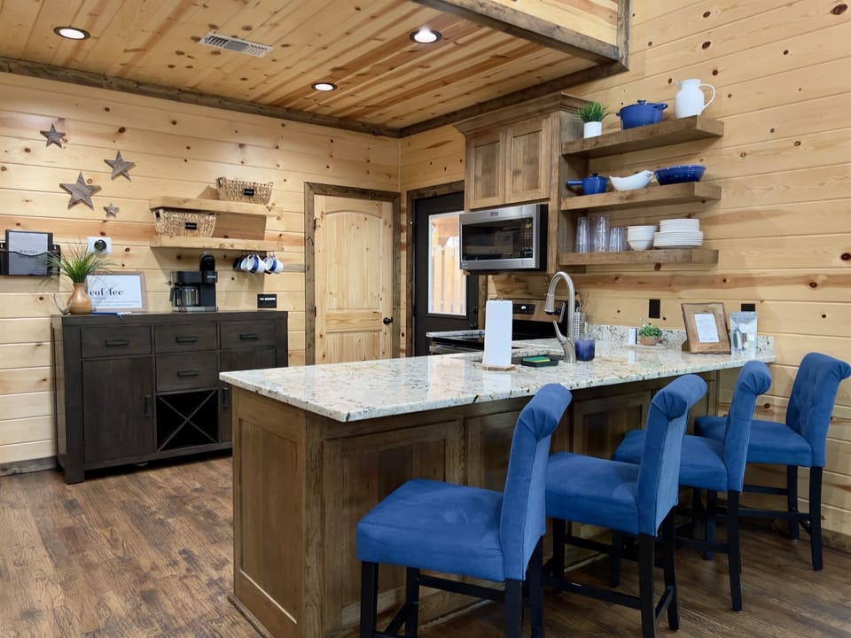 Enjoy the coffee station with additional shelf space for groceries!