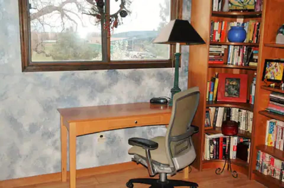 Middle bedroom - frequently utilized as a work space.  Full size bed