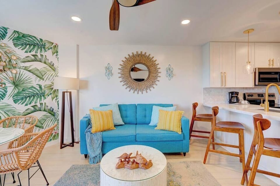 Happy times ahead in this bright and fun space!  Sleeper sofa, linens provided