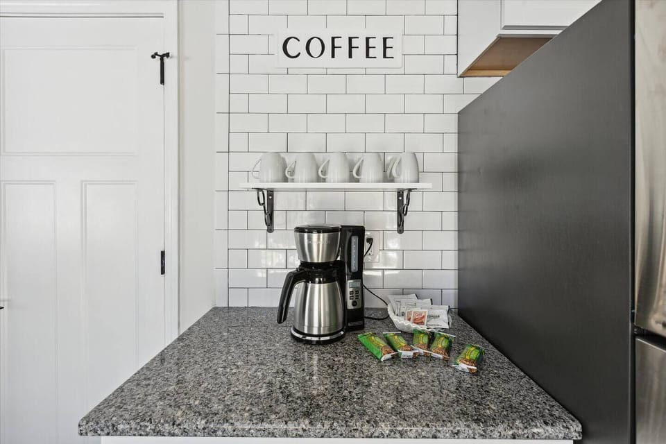 Grab your morning hot beverage from the coffee station, fully outfitted with all the supplies you need – snacks, too!