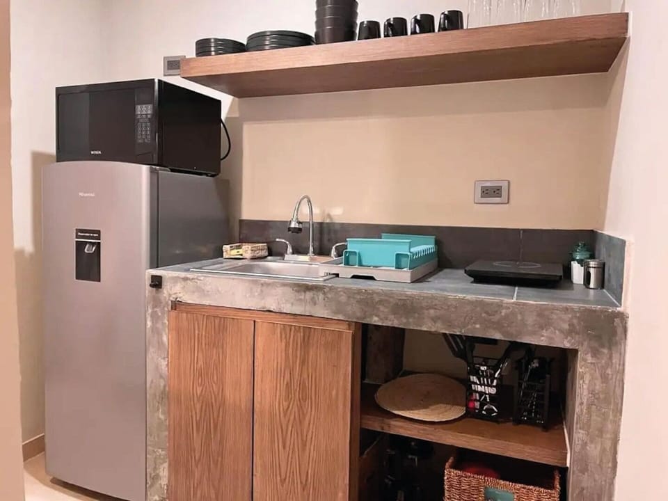 Cocina con las amenidades necesarias para tu estancia.