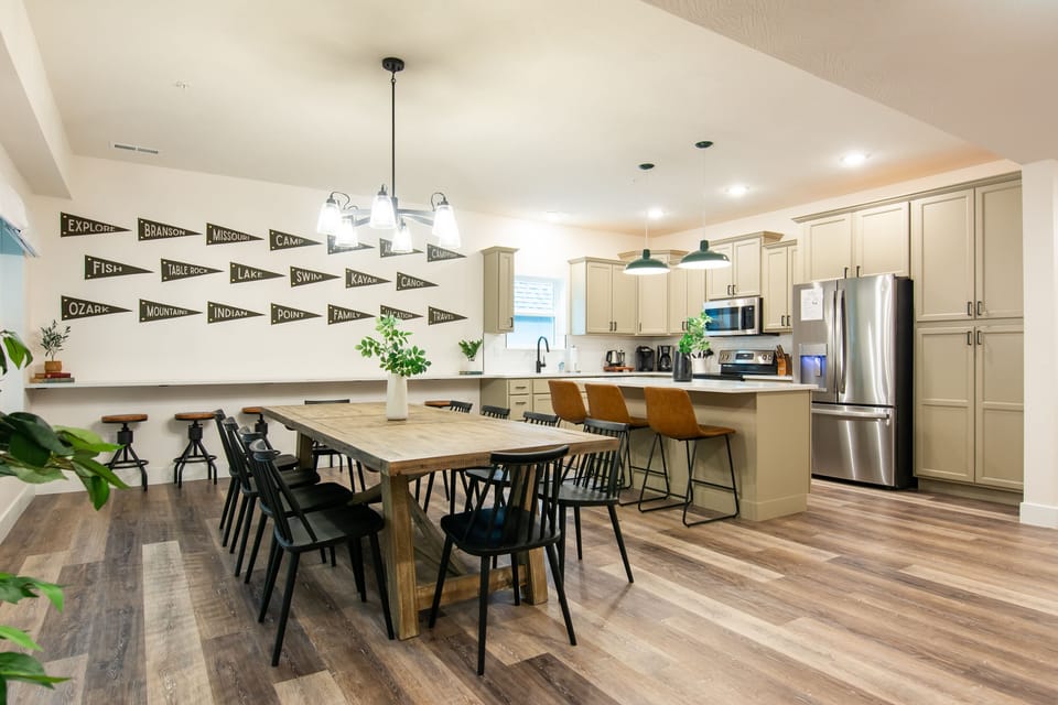 Dining room with tons of seating with fully equipped kitchen