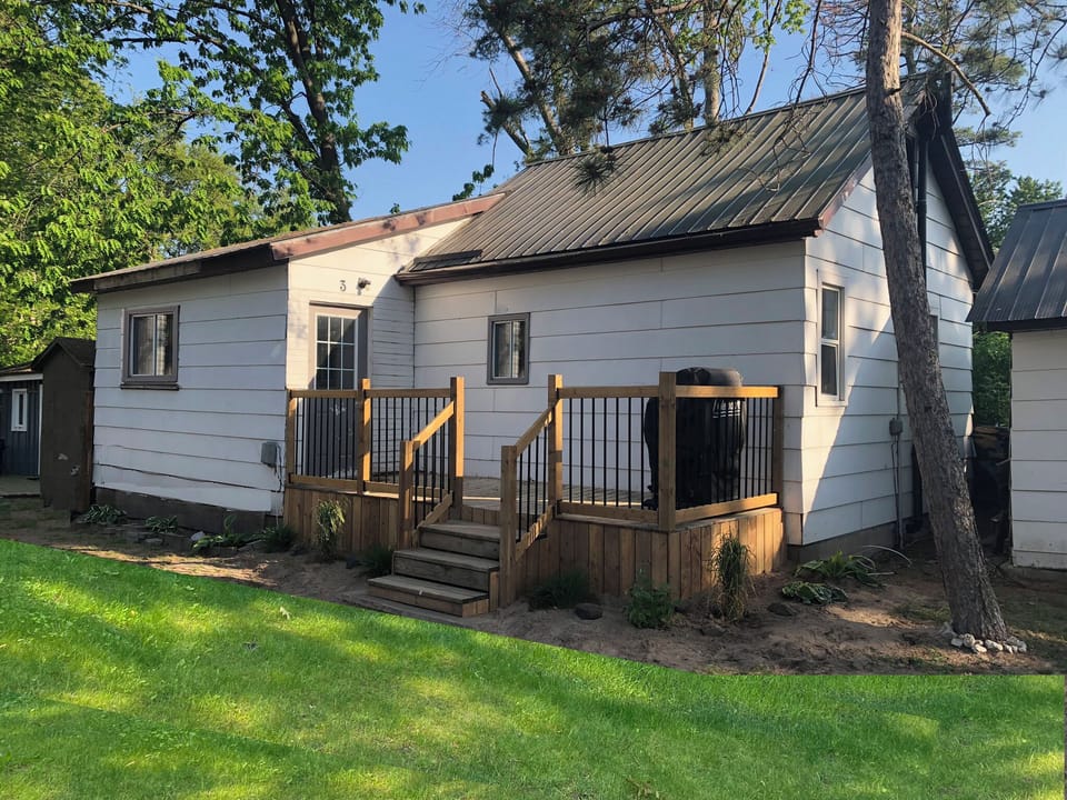 View from outside.  Living room on the left, bedrooms on the right. BBQ included