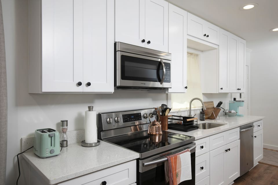 A fully stocked kitchen, perfect for preparing meals for family and friends.