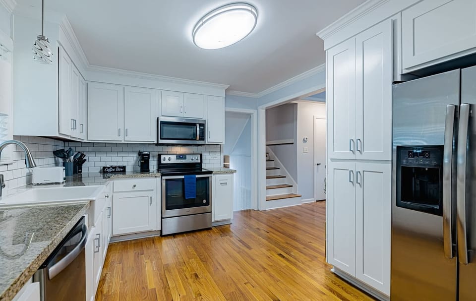 Fully equipped kitchen
with modern
appliances, cookware,
coffee maker, and
everything needed for
home cooked meals