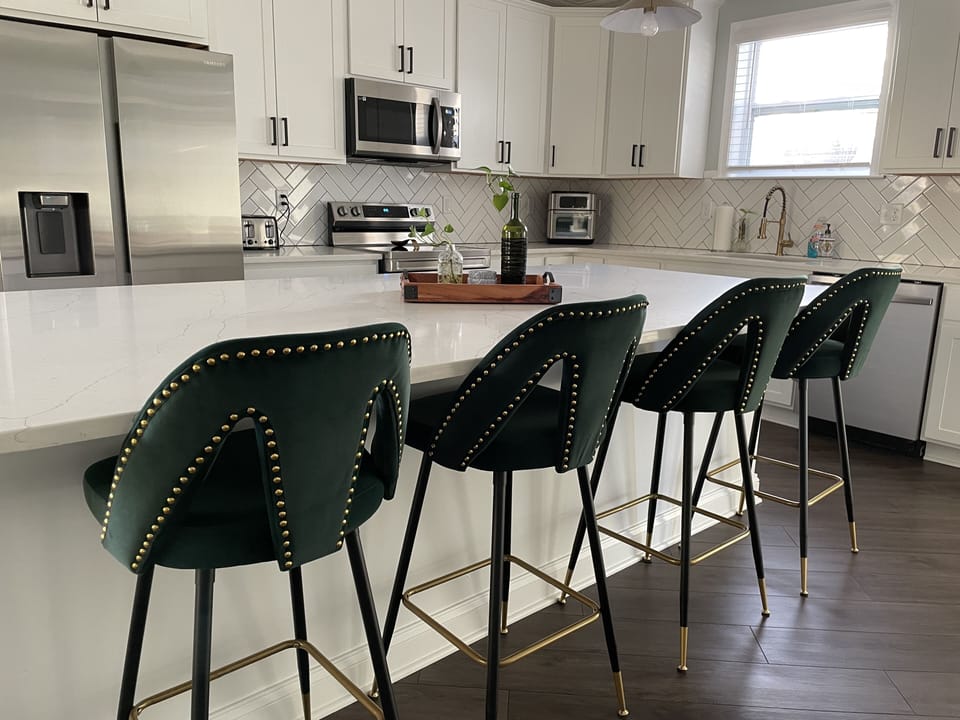 Beautiful, unique barstools at the center island.