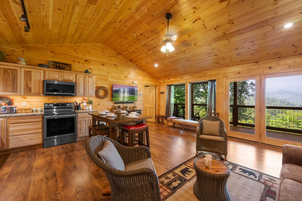 Watch away with a 55'' 4k smart Roku TV in the living room on the rocking chair!