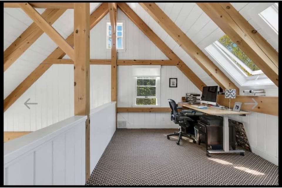 Second Floor Loft with office space and laundry. Room for 2 roll away beds