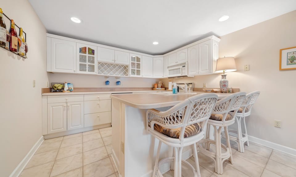 Lower Level Full Kitchen with mini fridge, oven, microwave, and dishwasher!