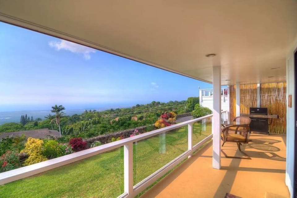 Lanai view to the North over the coffee fields and 40 miles of coastline