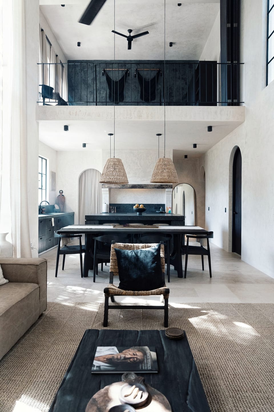 The living room, kitchen and mezzanine suite.