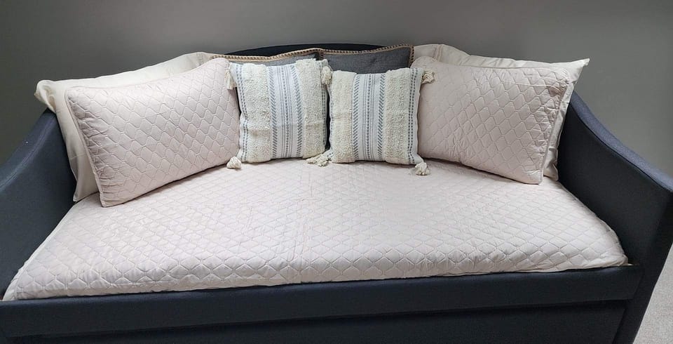 Twin day bed with twin trundle. (Sleeps 2) in the upstairs media room.