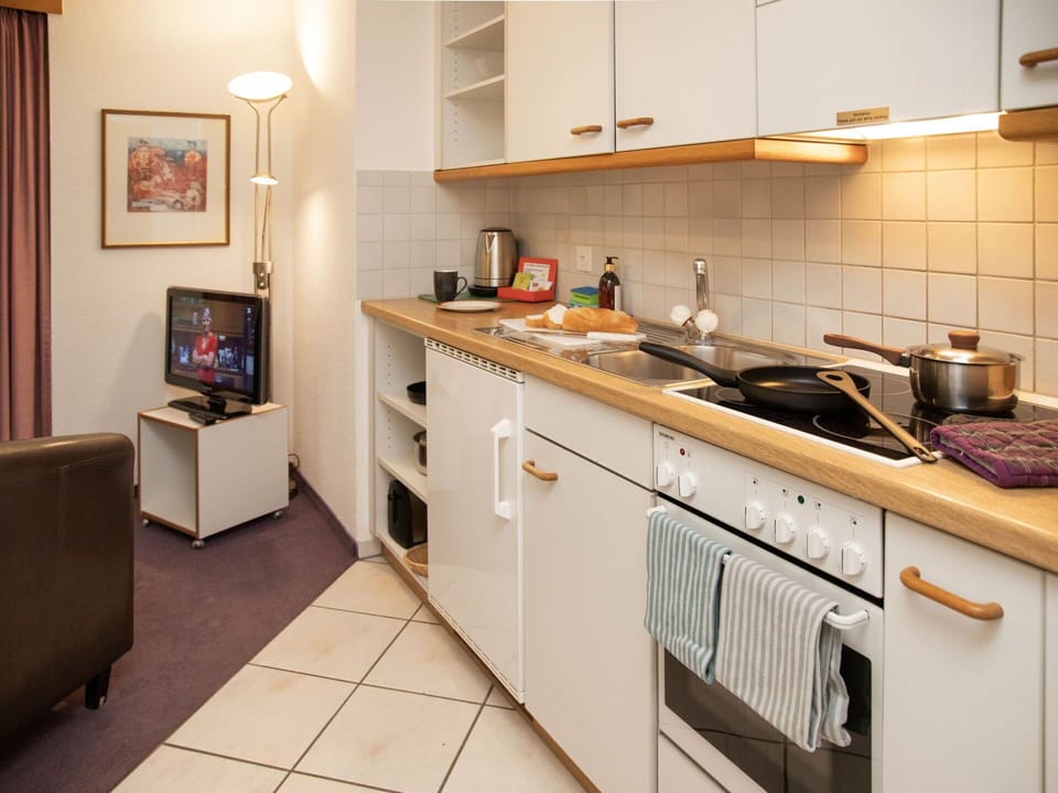 Furniture, Interior Design, Kitchen Appliance, Major Appliance, Wood, Kitchen, Flooring, Countertop, Cabinetry, Floor