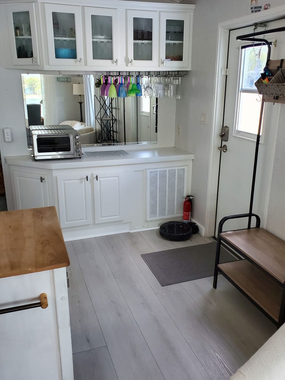 Entryway.  Roomba vacuum.