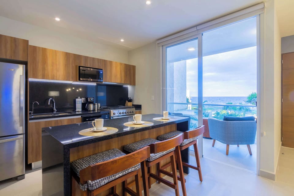 A breakfast bar with an ocean view.