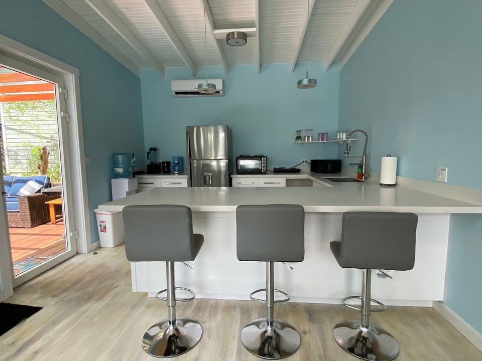 Large kitchen, full fridge and quartz countertops.
