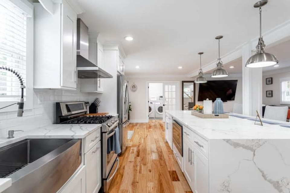 The sleek quarts countertops make prepping meals for the group easy