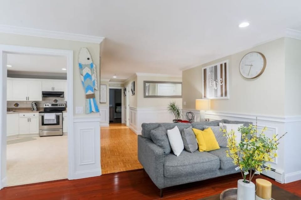 The dining area flows seamlessly into the modern kitchen