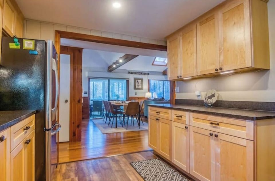 Newly renovated kitchen with plenty of Dishes, Pots,  Pans, and Utensils. 